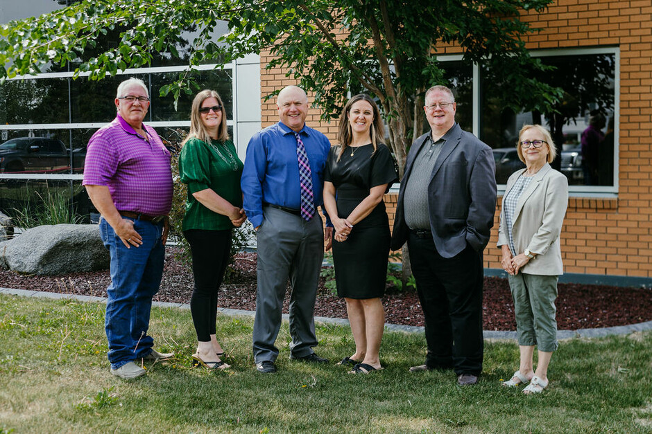 From left to right: Melvin Abraham, Jan Rajoo, Darcy Younghans, Sylvie Smyl, Dwight Wiebe, Lorette Andersen